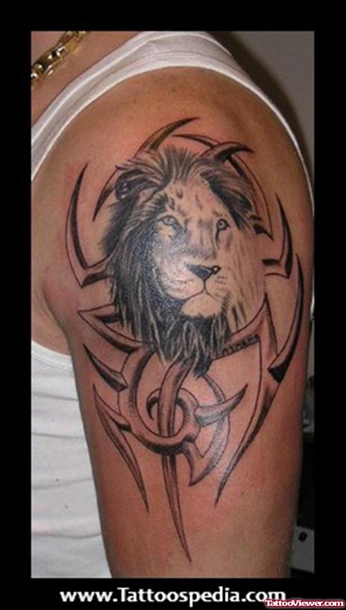 Tribal And Lion Tattoo On Half Sleeve