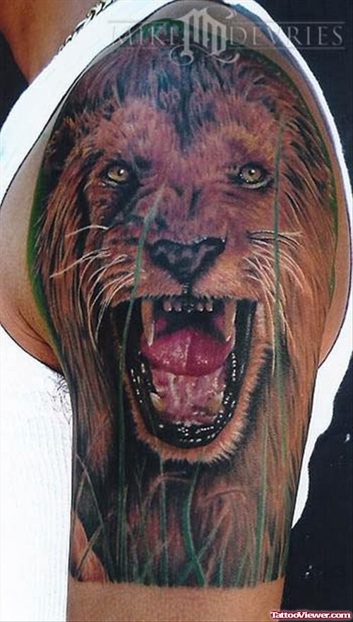 Man Left Shoulder Angry Lion Tattoo