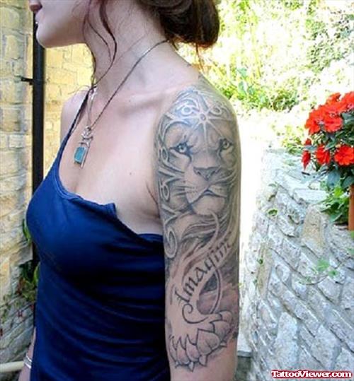 Grey Ink Lion Tattoo On Left Half Sleeve