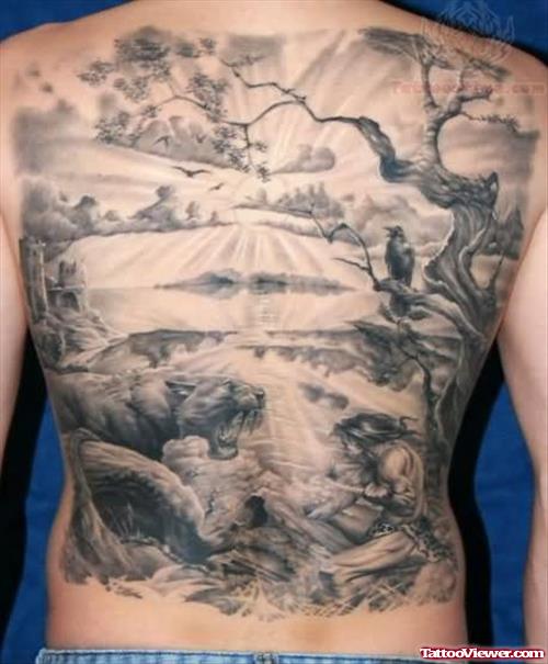 Grey Ink Bird On Tree Lion Tattoo