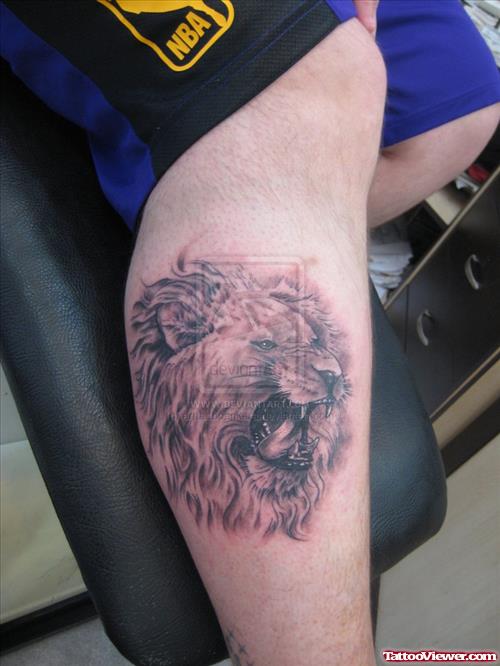 Grey Ink Roaring Lion Tattoo On Leg