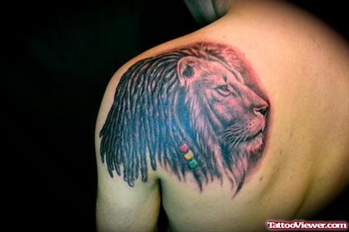 Grey Ink Lion Head Tattoo On Back Shoulder
