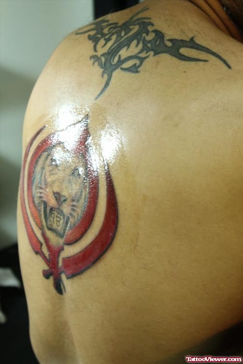 Red Khanda And Lion Tattoo On Back