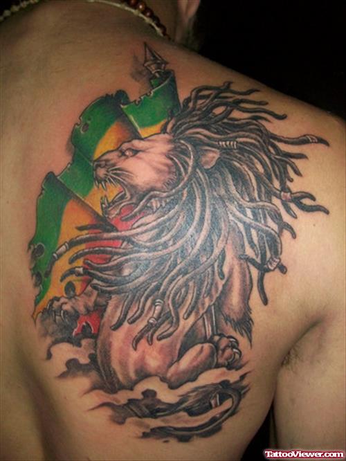 Colored Flag And Lion Tattoo On Back Shoulder