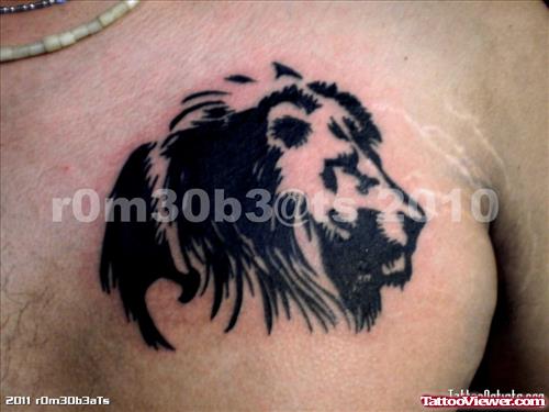 Black Lion Head Tattoo On Man Chest