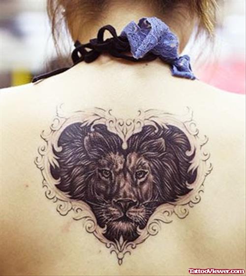 Grey Ink Heart and Lion Tattoo On Upperback