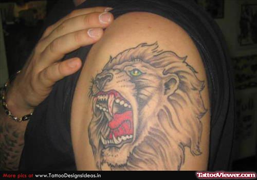 Man Left Shoulder Colored Lion Head Tattoo