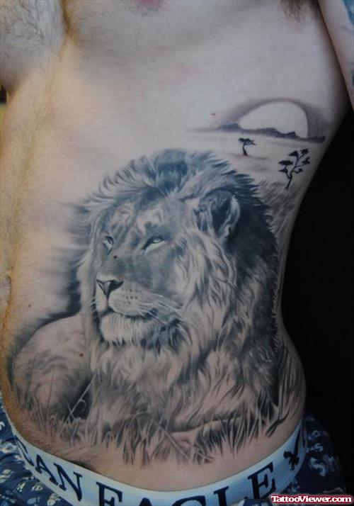 Grey Ink Lion Tattoo On Rib Side
