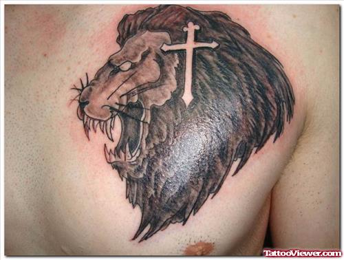Cross And Lion Head Tattoo On Chest