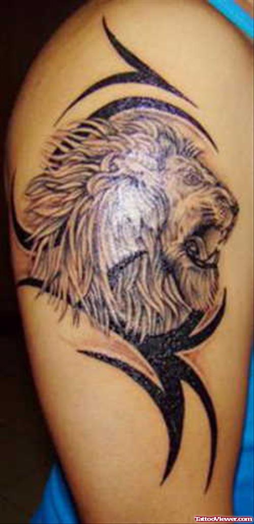 Black Tribal And Lion Head Tattoo On Sleeve