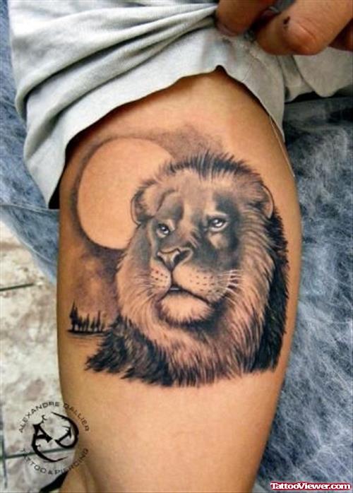 Grey Ink Lion Head Tattoo On Biceps