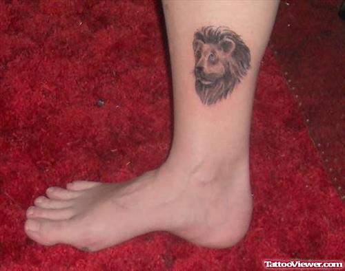 Lion Face Tattoo On Leg