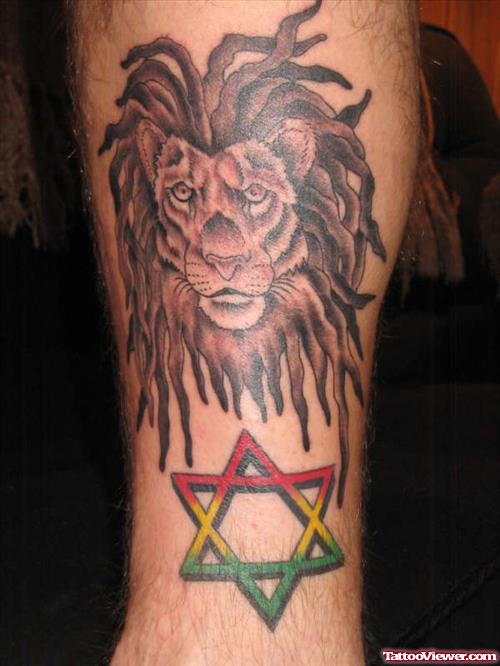 Lion And Star Tattoo On Leg