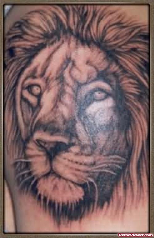 Showing Lion Face Tattoo