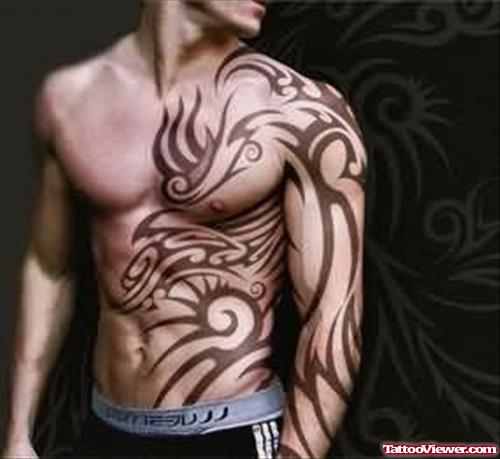 Tribal Lion Face Tattoo On Arm And Chest