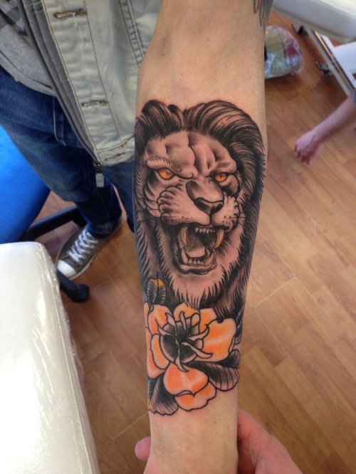 Flower And Lion Tattoo On Left Arm