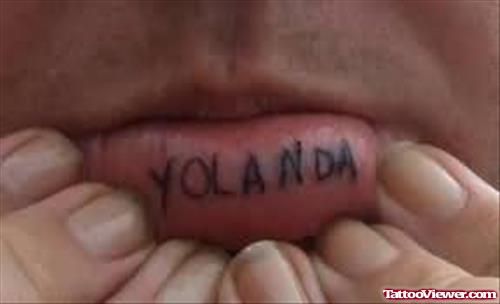 Yolanda Tattoo On Lip