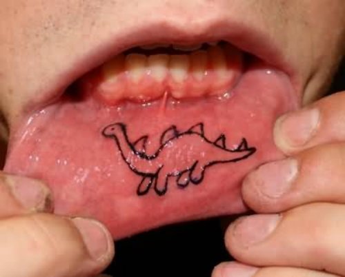 Dinasour Tattoo On Lips