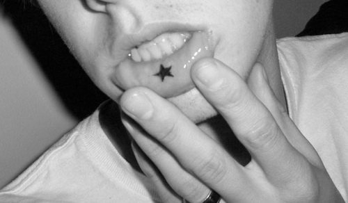 Black Star Inner Lip Tattoo