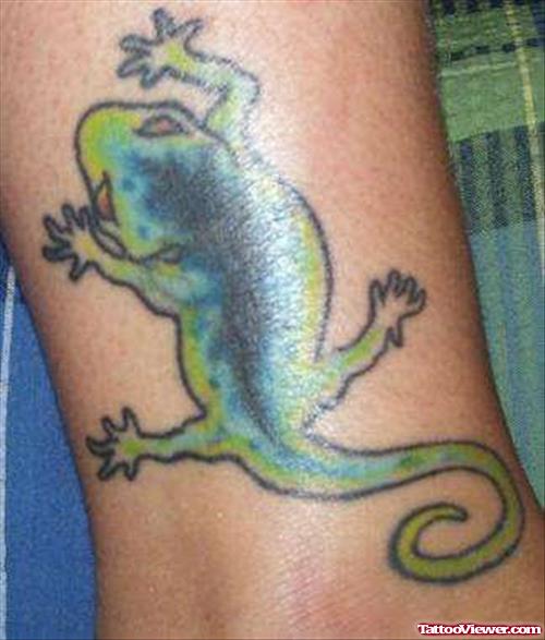 Black And Green Lizard Tattoo