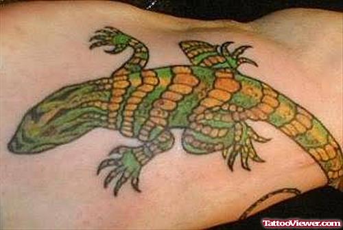 Yellow And Green Lizard Tattoo