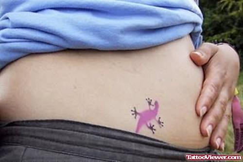 Purple Ink Lizard Tattoo On Belly