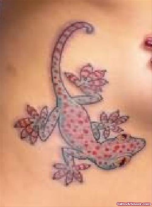 Lizard Spots Tattoo On Rib