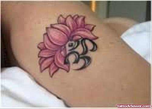 Lotus Flower And Religious Symbol Tattoo