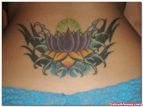 Women Lower Back Lotus Tattoos Designs