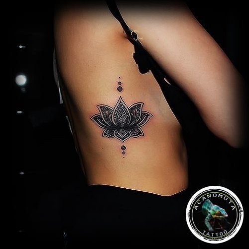 Stunning Black Lotus Tattoo On Side rib