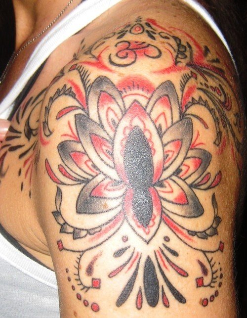 Lotus Flower Tattoo On Man Left Shoulder