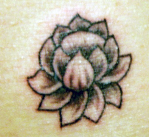 Grey Ink Lotus Flower Tattoo