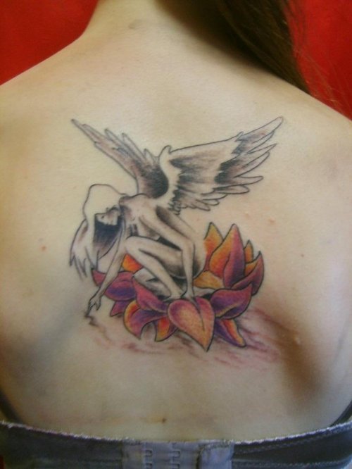 Grey Ink Angel And Lotus Tattoo On Back