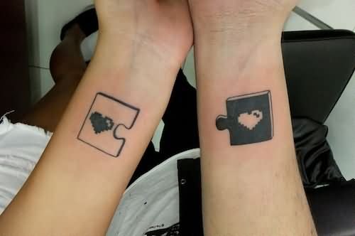 Puzzle Heart Love Tattoos On Forearm