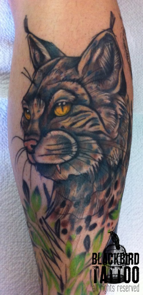 Yellow Eyes Grey Ink Lynx Tattoo