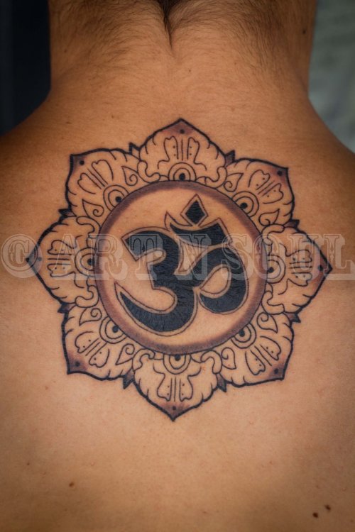 Om Symbol and Mandala Tattoo On Upperback