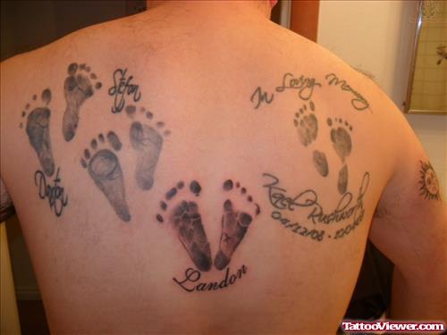 Foot Prints Memorial Tattoo on Back