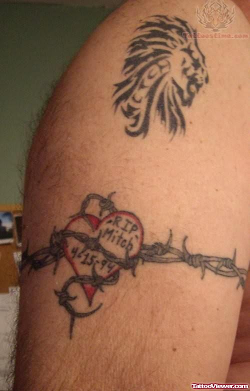 Barbed Heart Tattoo On Bicep