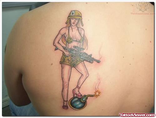 Military Girl With Gun Tattoo On Back