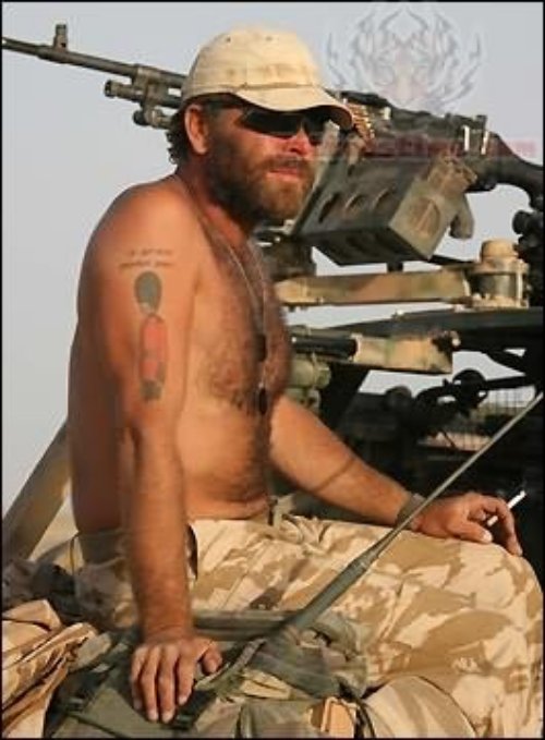 Military Man Bicep Tattoo