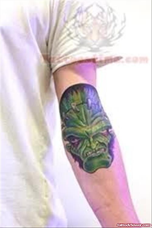 Monster Tattoo on Elbow