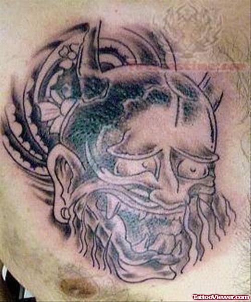 Monster Head Tattoo On Chest
