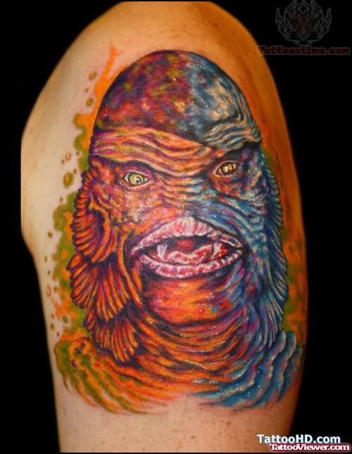 Monster Face Tattoo On Shoulder