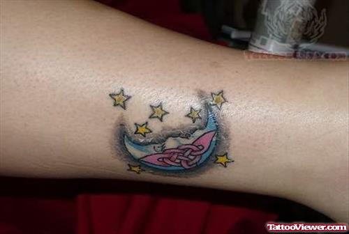 Moon And Stars Tattoos On Arm
