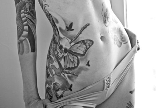 Skull Moth Tattoo On Girl Side Rib