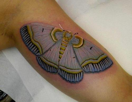 Cute Blue Ink Moth Bicep Tattoo