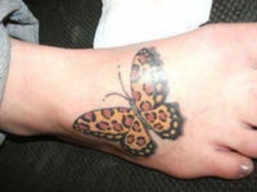 Right Foot Moth Tattoo