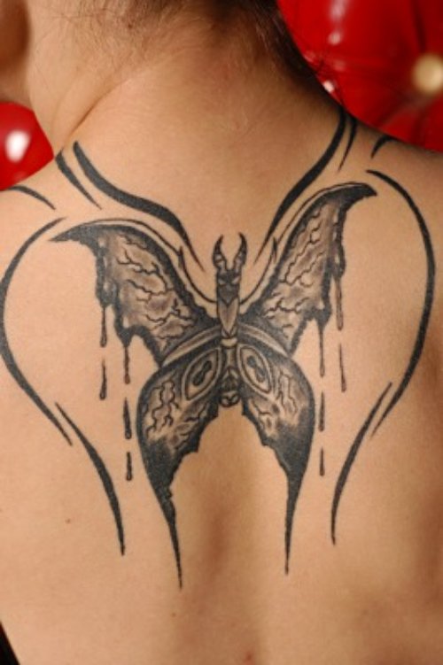 Black Ink Moth Tattoo On Back