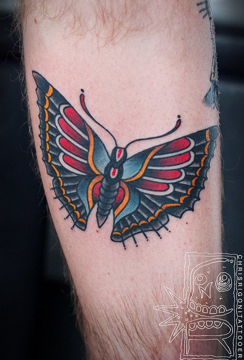 Dreadful Colored ink Moth Tattoo On Left Arm