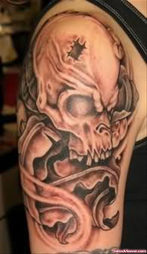 Extreme Skull Tattoo On Muscle